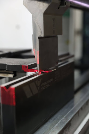 CNC Press Brake - Tooling and Laser Guide CNC press brake tooling with laser alignment guide