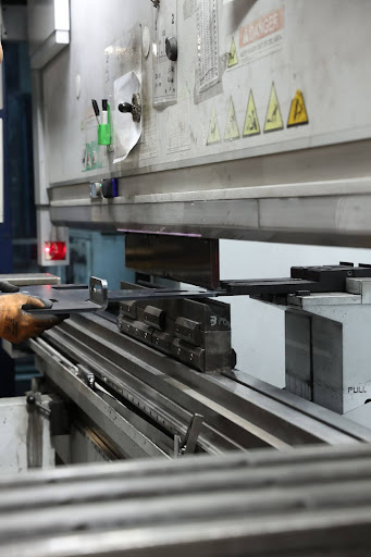 CNC Press Brake - Panels and Structural Parts CNC press brake forming panels and structural parts